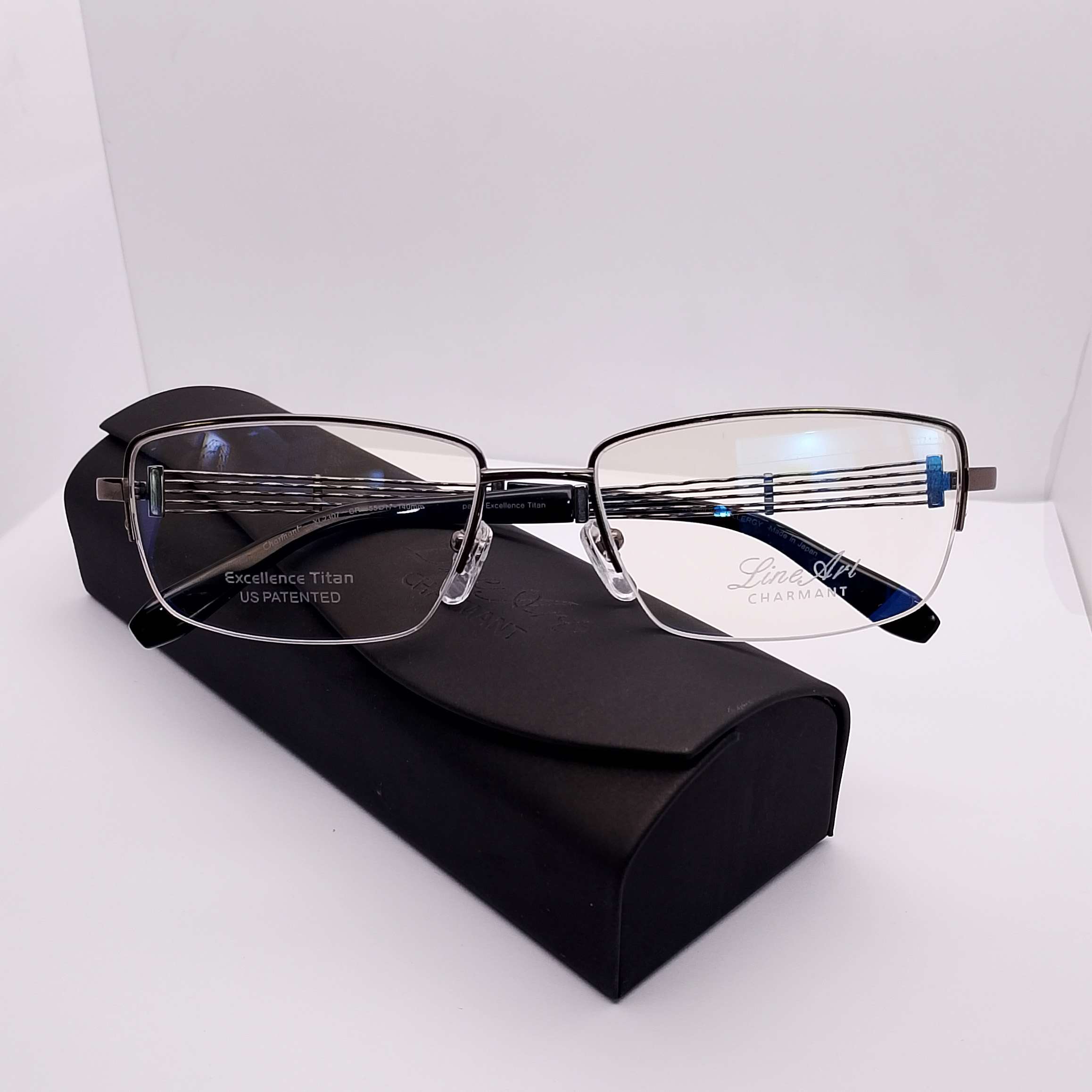 XL2307 Line Art by Charmant Titanium Half Rim - Image 3