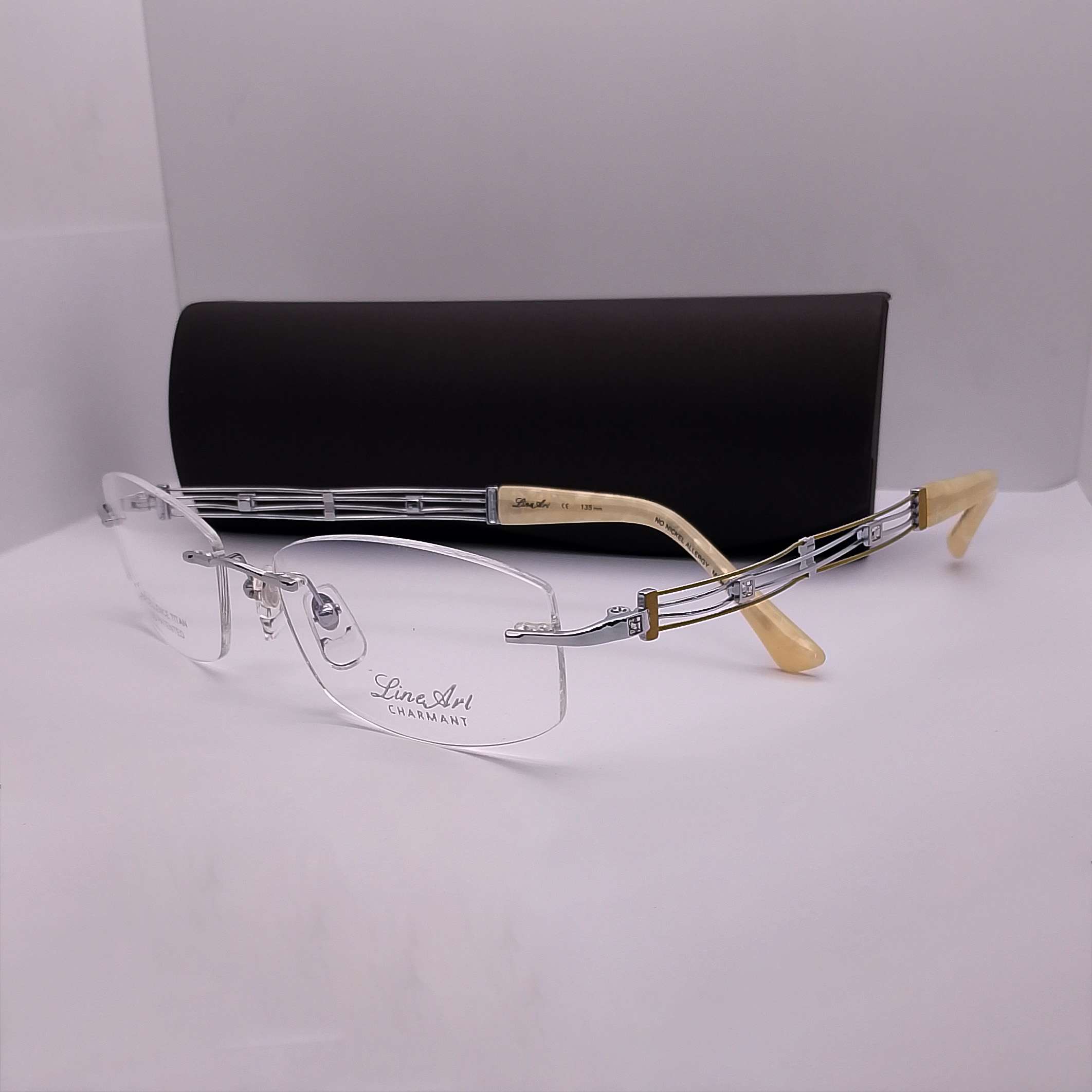 XL2025 Line Art by Charmant Titanium Rimless