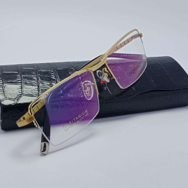Charmant Z titanium half-rim eyeglasses in gold, Nine Optic
