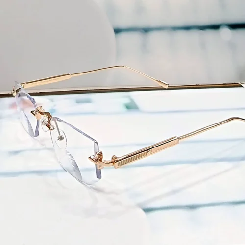 N-102 Elite Gold gold rimless reading glasses — front view